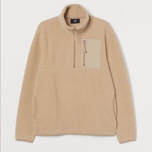 Beige. Half-zip jacket. Very soft. Only worn a few times.